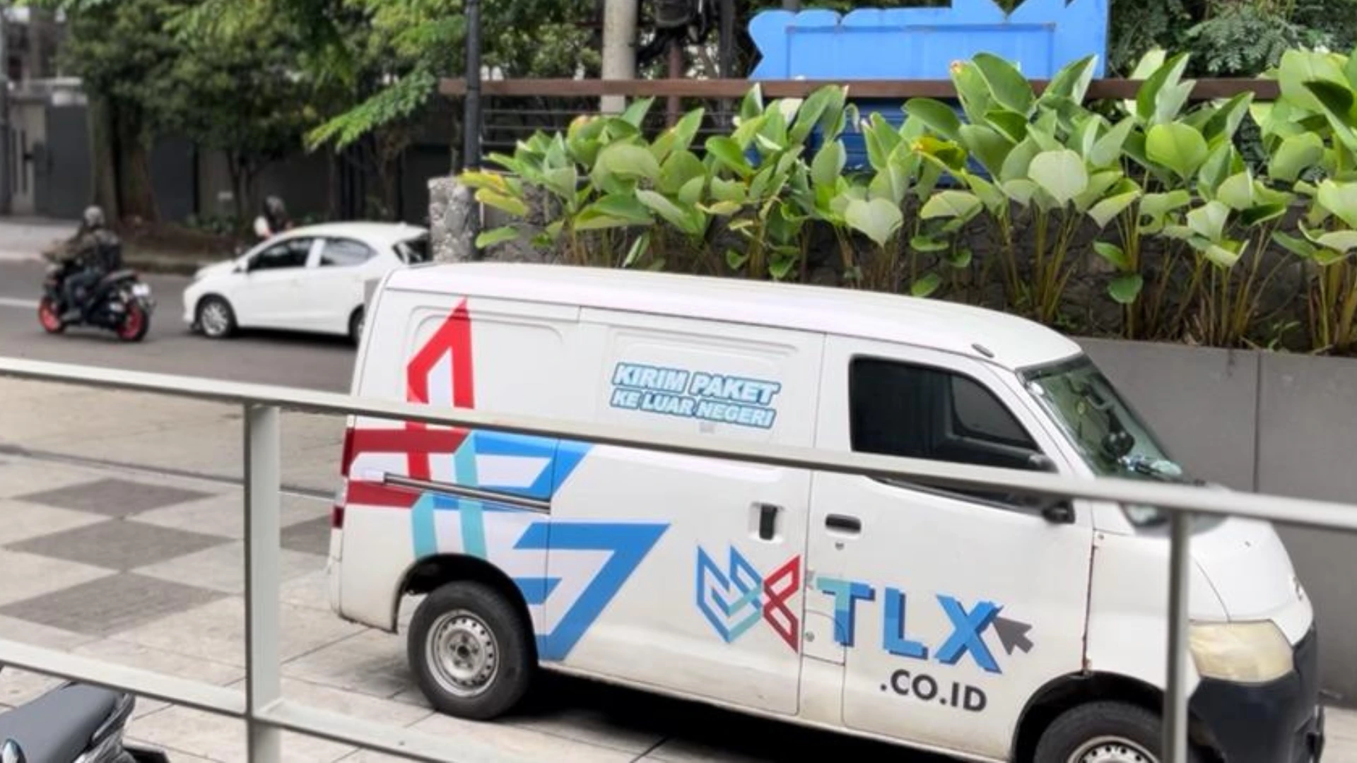 TLX courier with customer